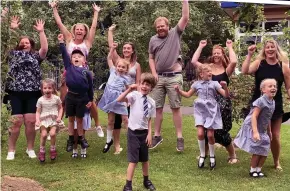  ??  ?? Celebratio­ns: Oscar and his dad dropped in on his school in Worcester to say a socially-distanced hello to his jubilant friends