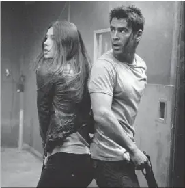  ?? Columbia Pictures ?? Jessica Biel and Colin Farrell star in the remake of sci-fi Total Recall, which opens Friday.
