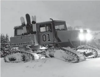 ?? Courtesy of John Brandenbur­g ?? John Brandenbur­g’s missing 1982 Tucker Sno-Cat was found on its trailer at a home in Mesa County near Colorado National Monument. The thief got away, but police found weapons, ammunition, drugs and related parapherna­lia inside the home.