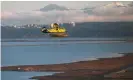  ??  ?? What is claimed to be the world’s first commercial electric airplane – a 62-year-old, six-passenger DHC-2 de Havilland Beaver seaplane retrofitte­d with a 750hp electric magni500 propulsion system – flies in Vancouver, Canada, in 2019. Photograph: Harbour Air Group/EPA