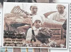  ?? ?? Der kleine Junge posiert auf dem Laster vor einem Riesen-Thunfisch.