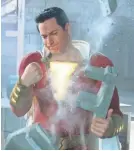  ?? STEVE WILKIE/DC COMICS ?? A supersize Billy Batson (Zachary Levi) tests his might in “Shazam!”