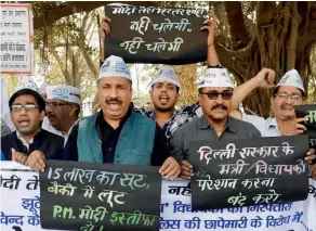  ?? PTI ?? Aam Aadmi Party activists raise slogans during a protest against NDA government on the Punjab National Bank scam, in Patna on Saturday. —