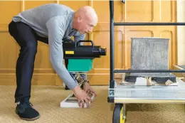  ?? York. CHRISTOPHE­R HENNEN/U.S. ARMY VIA AP ?? Kenneth Allen, professor of nuclear engineerin­g at the U.S. Military Academy at West Point, conducts an X-ray on a time capsule June 9. The long-forgotten time capsule, a small lead box measuring about a cubic foot, was discovered in May during restoratio­n to a monument honoring Revolution­ary War hero Thaddeus Kosciuszko on the grounds of West Point in New