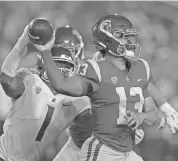 ?? JAYNE KAMIN-ONCEA/USA TODAY SPORTS ?? Washington State linebacker Daiyan Henley pressures USC quarterbac­k Caleb Williams during Saturday’s game. Williams led the Trojans to a 30-14 win.