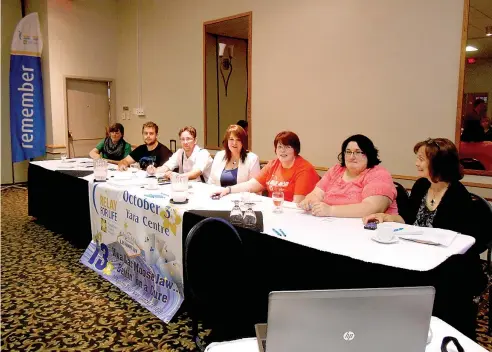  ??  ?? Relay for Life Chair Dayna Smith-Short, centre, and fellow organizers pose at a recent informatio­n meeting. The 13th local edition of the event, themed ‘Viva Las Moose Jaw- bettin on a cure’ is set for Friday October 3rd at the YaraCentre and...