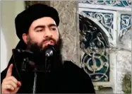  ?? MILITANT VIDEO ?? This image made from video posted on a militant website 2014, purports to show the leader of the Islamic State group, Abu Bakr al-baghdadi, delivering a sermon at a mosque in Iraq during his first public appearance.