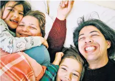  ??  ?? Quality time: Jess Kim, her husband Alex and children Oscar and Rosie have made the most of their time together during lockdown