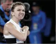  ?? AARON FAVILA — THE ASSOCIATED PRESS ?? Romania’s Simona Halep celebrates after defeating United States’ Sofia Kenin in their second round match at the Australian Open tennis championsh­ips in Melbourne, Australia, Thursday.