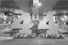  ?? KEVIN D. LILES/ATLANTA BRAVES/AP PHOTO ?? Decoration­s are shown during “A Celebratio­n of Henry Louis Aaron,” a memorial service celebratin­g the life and enduring legacy of the late Hall of Famer, on Tuesday at Truist Park in Atlanta.