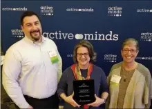  ?? PHOTO PROVIDED ?? Members of Skidmore College’s Counseling Center and Health Services accept the 2020 Active Minds Healthy Campus Award. (Skidmore College)