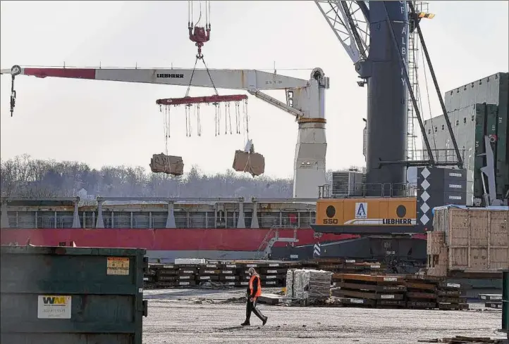  ?? Photos by Will Waldron / Times Union ?? Tony Vasil, the Port of Albany’s maritime business developmen­t manager, says restarting the barge service will benefit both the economy and the environmen­t.