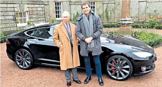  ??  ?? Prince Charles and Kimbal Musk in Scotland with the Tesla electric model