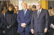  ?? Evan Vucci Associated Press ?? PRESIDENT Trump and the Rev. Franklin Graham during a ceremony at the U.S. Capitol in 2018.