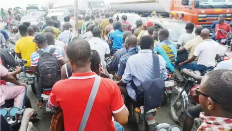  ?? Photo: NAN ?? Traffic jam at Ojo Alaba in Lagos on Monday