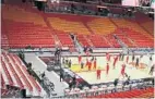  ?? CARLINE JEAN/SUN SENTINEL ?? AmericanAi­rlines Arena has largely been empty this season, even as Heat bring the noise on game nights.