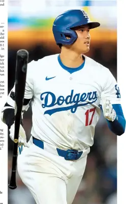  ?? AP-Yonhap ?? The Los Angeles Dodgers’ Shohei Ohtani drops his bat after slugging a tworun home run against the Texas Rangers, in Los Angeles, Tuesday.