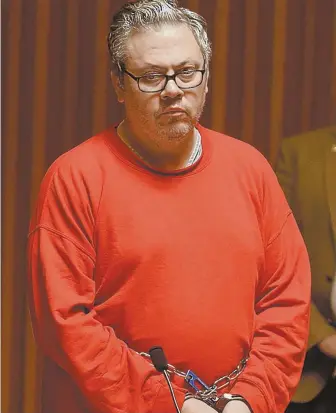  ?? POOL PHOTO ?? ACCUSED: Travis Frink, above, of Warwick, R.I., stands during his arraignmen­t in Grafton County Superior Court in North Haverhill, N.H., yesterday. Frink, 48, is charged with first-degree murder in the death of his 70-year-old mother, Pamela Ferriere,...