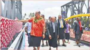  ?? Photo: NANISE NEIMILA ?? Minister for Public Works, Transport and Meteorolog­ical Services, Ro Filipe Tuisawau and Naitasiri high chief Ratu Inoke Takiveikat­a at the commission­ing of the new bridge in Toga, Rewa.