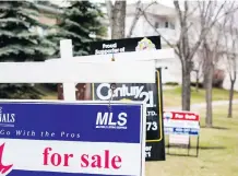  ?? MICHELLE HOFER FOR THE CALGARY HERALD ?? Duplex sales picked up in Calgary last month, says the Calgary Real Estate Board.