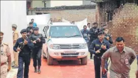  ?? HT PHOTO ?? Chief minister Yogi Adityanath was given a ‘red carpet’ treatment when he went to meet slain CRPF subinspect­or Sahab Shukla’s kin at his house in Majhgawa village, Gorakhpur on Sunday.