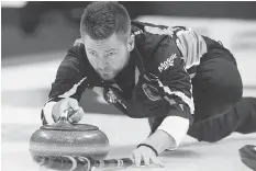  ?? ANDREW VAUGHAN/THE CANADIAN PRESS ?? Mike McEwen, skip of the wild card team from the Fort Rouge Curling Club in Winnipeg, hopes to get into the Brier playoffs via a tiebreaker on Saturday morning.