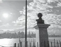  ?? Andrew Dansby / Houston Chronicle ?? Aaron Burr mortally wounded Alexander Hamilton in Weehawken, N.J., in 1804. Railroad tracks cover the site of their duel, but a monument to Hamilton now sits above the banks of the Hudson River. The destinatio­n offers stunning views of New York.