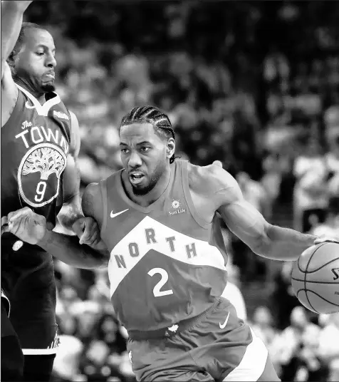  ?? BEN MARGOT/AP ?? After much speculatio­n, Kawhi Leonard (2) announced Friday that he will sign with the Los Angeles Clippers.