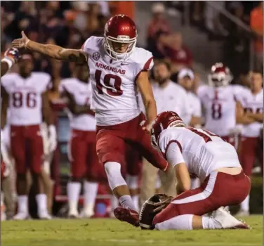  ?? Associated Press ?? Special teams: Arkansas kicker Connor Limpert (19) misses a field goal against Auburn during the first half Saturday in Auburn, Ala. The Tigers won 34-3.