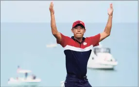  ?? Ashley Landis / Associated Press ?? Team USA’s Collin Morikawa reacts after winning the 17th hole during a Ryder Cup singles match at the Whistling Straits Golf Course on Sunday in Sheboygan, Wis.