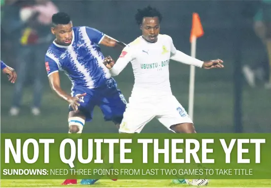  ?? Picture: Gallo Images ?? ALWAYS DANGEROUS. Percy Tau of Mamelodi Sundowns shields the ball from Bokang Tlhone of Maritzburg United in their clash at Harry Gwala Stadium last night.