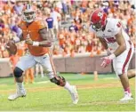  ?? RICHARD SHIRO/ASSOCIATED PRESS ?? Clemson’s Deshaun Watson, left, remains one of the most dynamic quarterbac­ks in the country.