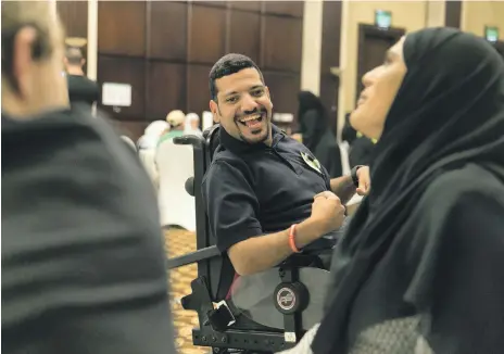  ?? Reem Mohammed / The National ?? Emirati Ahmed Al Qubaisi, who has cerebral palsy, says the Special Olympics gave him the opportunit­y to learn and motivate others to volunteer for the big event and use their time as he does