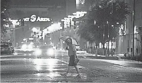  ?? MARK HENLE/THE ARIZONA REPUBLIC ?? Flood watches were in effect in Phoenix. Arizona could get Rosa’s heaviest rain.