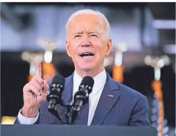  ?? FOTO: EVAN VUCCI/AP ?? Joe Biden überrascht­e Politik-Experten mit seinem radikalen Kurswechse­l seit dem Wahlkampf.