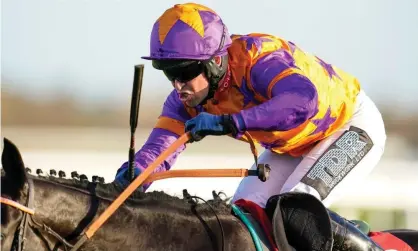  ?? Photograph: Alan Crowhurst/Getty Images ?? Robbie Dunne in action at Kempton on Monday.