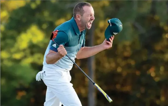  ?? HARRY HOW, GETTY IMAGES ?? Sergio Garcia of Spain celebrates after defeating Justin Rose of England on the first playoff hole during the final round of the 2017 Masters Tournament in Augusta, Ga., on Sunday.