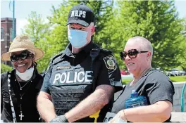  ?? ALLAN BENNER TORSTAR ?? Niagara Regional Police Chief Bryan Macculloch and several officers joined thousands of people, protesting violence against people of colour.