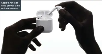 ??  ?? Apple’s AirPods have proved a hit with consumers