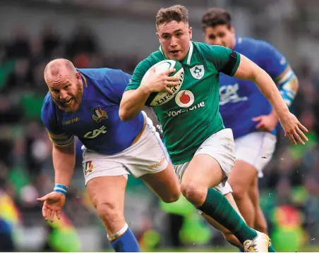  ??  ?? CLEAN PAIR OF HEELS: Jordan Larmour of Ireland runs the ball during yesterday’s Six Nations match between Ireland and Italy at the Aviva Stadium in Dublin. Photo: Seb Daly/Sportsfile