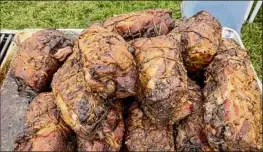  ?? Photos by Susie Davidson Powell / For the Times Union ?? Porchetta at a farm dinner at Stone Ridge Orchard in Ulster County, sponsored by Terrain & Table.