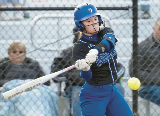  ?? MICHAEL GARD/POST-TRIBUNE ?? Lake Central’s Kiley Conner swings at a pitch during a game at Valparaiso.