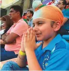 ?? Courtesy: Arjan’s family ?? Arjan being consoled by his father Amerpreet Singh after the drawn IndiaAfgha­nistan Asia Cup match. Wearing the Indian team’s jersey and a turban in the shades of the tricolour, online users found the little fan ‘so cute’.