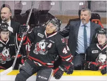 ?? CLIFFORD SKARSTEDT EXAMINER ?? Former Peterborou­gh Petes head coach Jody Hull, right, returns to the Memorial Centre as an associate coach for the Niagara Ice Dogs during OHL action on Thursday night at the Memorial Centre.