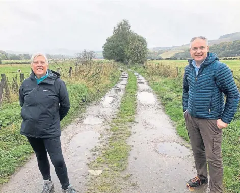  ??  ?? NEW ROUTE: Rothes Way Associatio­n member Pat Flynn, left, and Moray MSP Richard Lochhead on the current path.