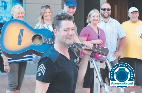  ?? Picture: GLENN HAMPSON ?? Look who’s back — Broadbeach Country Music Festival star Drew McAlister turned heads when he arrived on the Gold Coast yesterday.