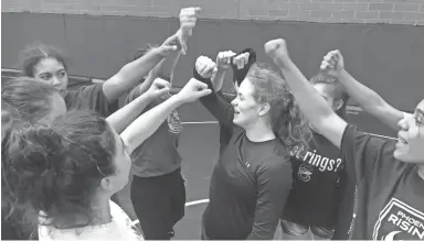  ??  ?? Chandler’s Stefana Jelacic, center, leads the team in a post-practice chant. BRITTANY BOWYER