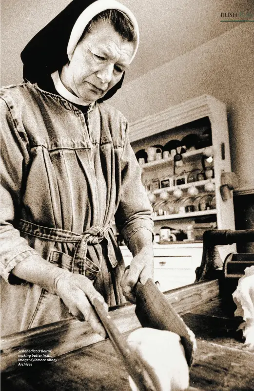  ??  ?? Sr Benedict O’Beirne making butter (n.d.). Image: Kylemore Abbey Archives