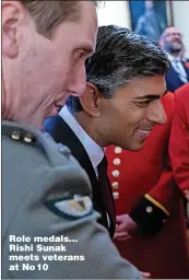  ?? ?? Role medals... Rishi Sunak meets veterans at No 10