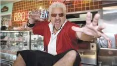  ??  ?? Guy Fieri hosts “Diners, Drive-ins and Dives”
